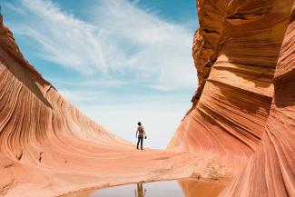 Man hiking in desert.